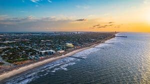 Aerial view of the Galveston, Texas coast at sunset.